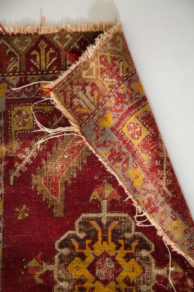 Antique red Turkish rug mat