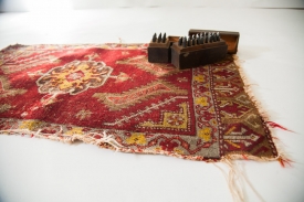 Antique red Turkish rug mat