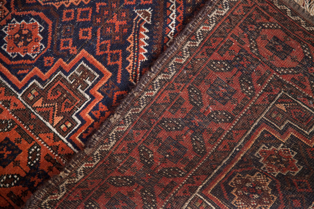 Vintage Antique Tribal Belouch rug