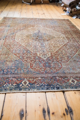 Distressed Antique Rug